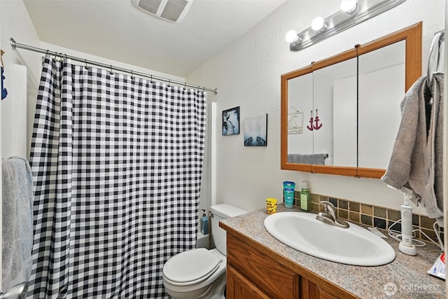 108 Baker St Unit 1-4, Everson, WA 98247 - bathroom with vanity, a shower with curtain, a textured wall, and decorative backsplash