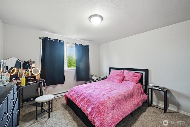 108 Baker St Unit 1-4, Everson, WA 98247 - carpeted bedroom featuring baseboards and a baseboard heating unit