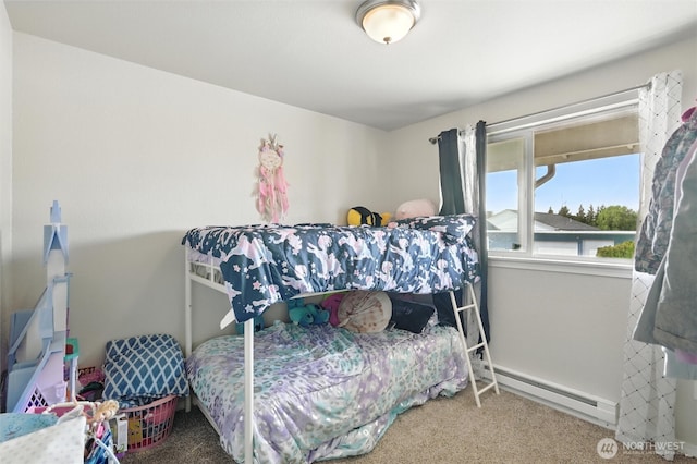108 Baker St Unit 1-4, Everson, WA 98247 - carpeted bedroom featuring a baseboard radiator and baseboards