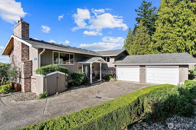 809 W Rocky Point Dr, Camano Island, WA 98282 - view of front facade featuring a chimney and a gate