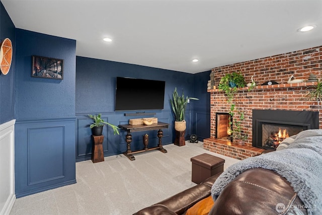 809 W Rocky Point Dr, Camano Island, WA 98282 - living area featuring a decorative wall, a fireplace, carpet floors, recessed lighting, and a wainscoted wall