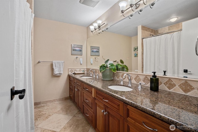809 W Rocky Point Dr, Camano Island, WA 98282 - full bathroom featuring double vanity and curtained shower