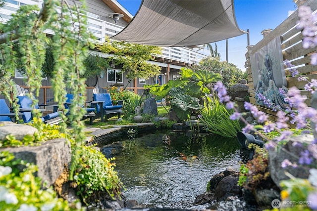 809 W Rocky Point Dr, Camano Island, WA 98282 - surrounding community with a garden pond