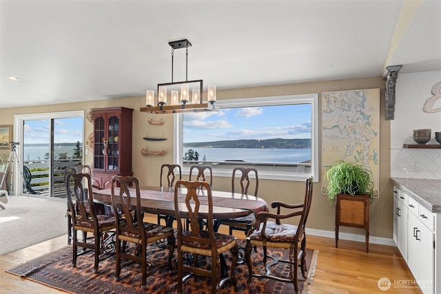 809 W Rocky Point Dr, Camano Island, WA 98282 - dining area with a chandelier and light wood-style floors