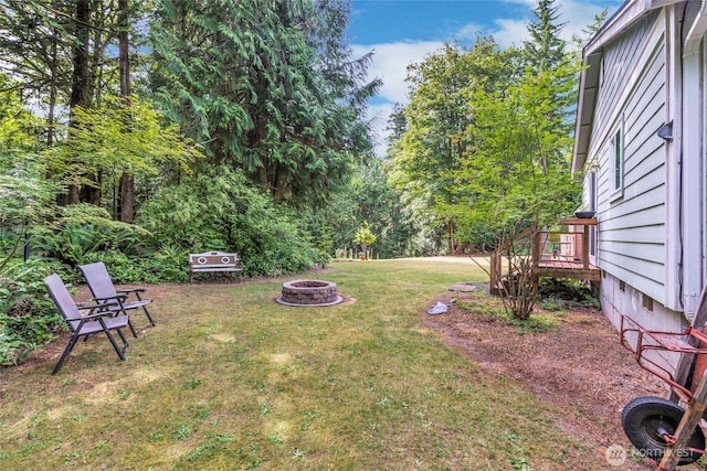 5626 Thane Ln SE, Port Orchard, WA 98367 - view of grassy yard with a fire pit