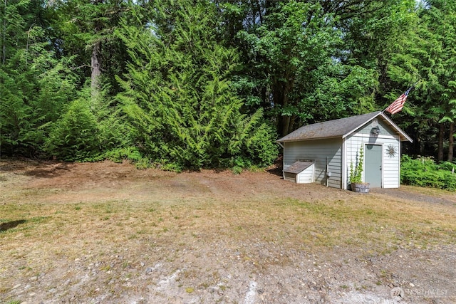 5626 Thane Ln SE, Port Orchard, WA 98367 - view of green lawn with a storage shed