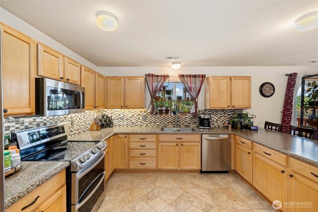 29745 214th Ave SE, Kent, WA 98042 - kitchen with stainless steel appliances and light brown cabinets