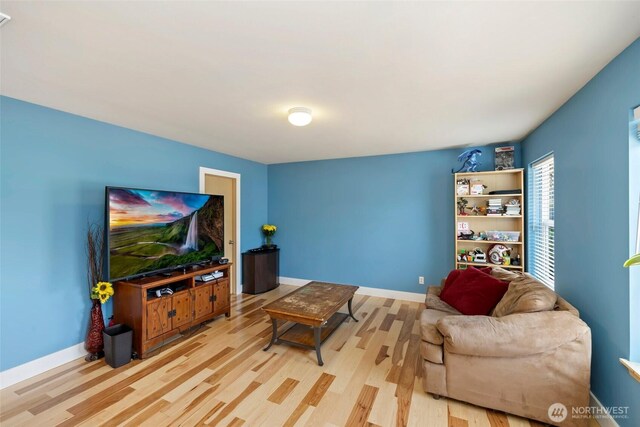 29745 214th Ave SE, Kent, WA 98042 - living room featuring light wood finished floors and baseboards
