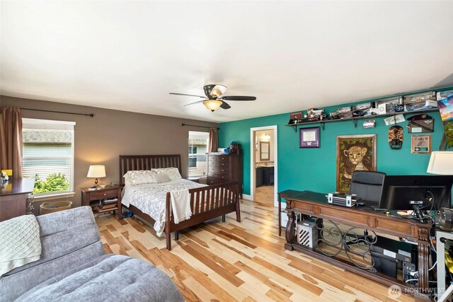 29745 214th Ave SE, Kent, WA 98042 - bedroom with wood finished floors, a desk, a ceiling fan, and ensuite bathroom