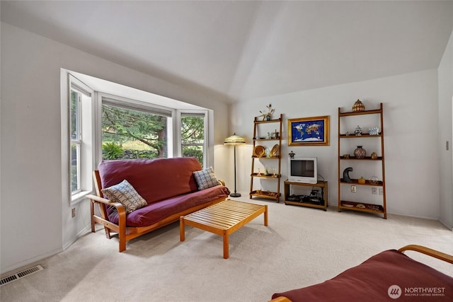 6345 Agnes Rd NE, Tacoma, WA 98422 - carpeted living area with vaulted ceiling and baseboards