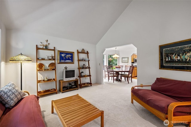 6345 Agnes Rd NE, Tacoma, WA 98422 - carpeted living room with high vaulted ceiling