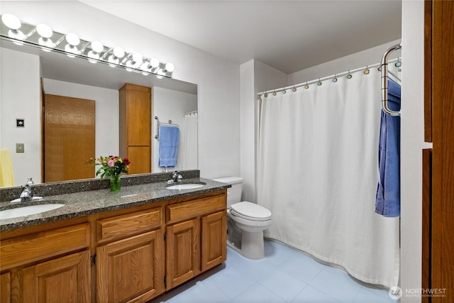 6345 Agnes Rd NE, Tacoma, WA 98422 - bathroom featuring double vanity and tile patterned floors