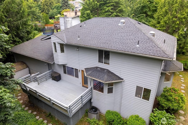 6345 Agnes Rd NE, Tacoma, WA 98422 - back of property with roof with shingles, a shed, and a deck