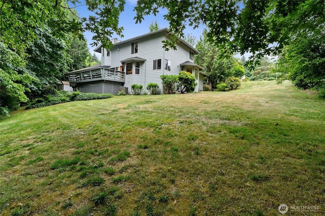 6345 Agnes Rd NE, Tacoma, WA 98422 - view of green lawn featuring a deck