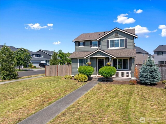 3119 13th Avenue Ct NW, Puyallup, WA 98371 - traditional-style house featuring a porch and roof with shingles