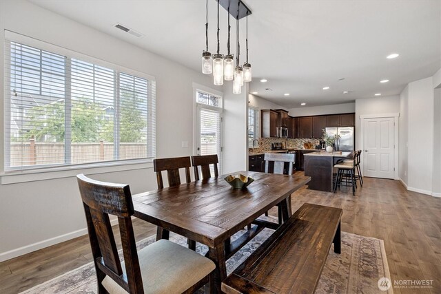 3119 13th Avenue Ct NW, Puyallup, WA 98371 - dining room featuring light wood-style floors and recessed lighting