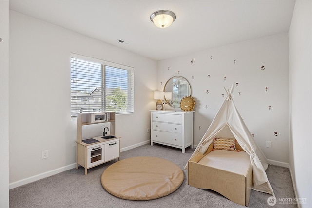 3119 13th Avenue Ct NW, Puyallup, WA 98371 - recreation room featuring light carpet and baseboards