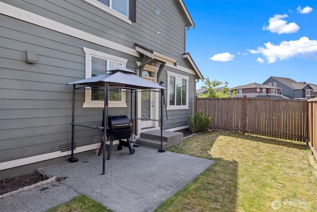 3119 13th Avenue Ct NW, Puyallup, WA 98371 - fenced backyard with a gazebo and a patio