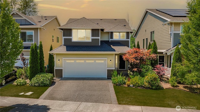 4508 29th Ave SE, Everett, WA 98203 - view of front of home with driveway, roof with shingles, a garage, and a yard