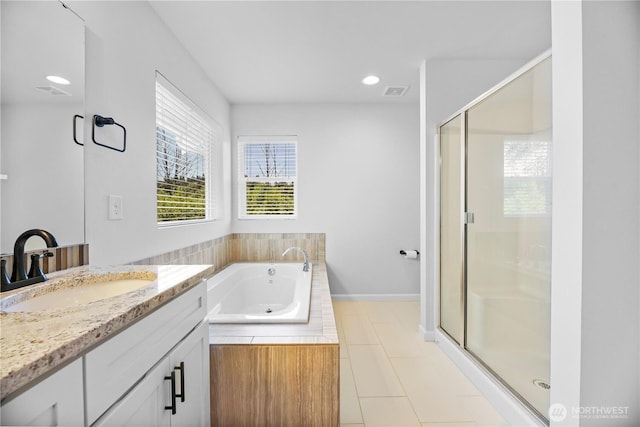 4508 29th Ave SE, Everett, WA 98203 - bathroom with vanity, a shower stall, a whirlpool tub, tile patterned floors, and recessed lighting