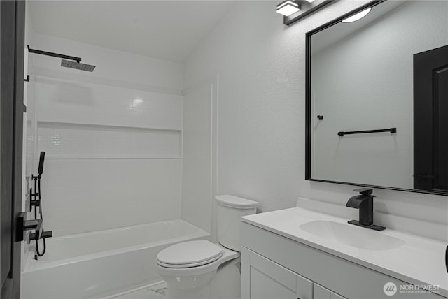 5279 SE Lars Hansen Rd, Port Orchard, WA 98367 - bathroom with vanity, shower / bathtub combination, and marble look tiles