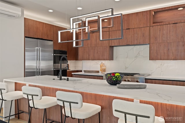 11888 SE 5th St, Bellevue, WA 98005 - kitchen featuring high quality fridge, a wall mounted AC, brown cabinets, modern cabinets, and recessed lighting