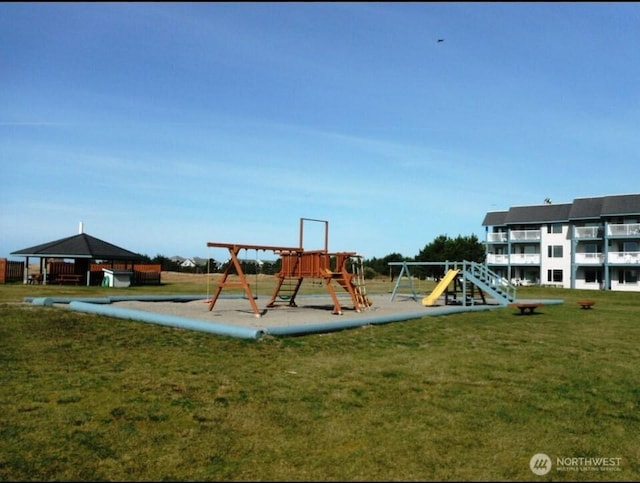 210 26th St NW Unit 106, Long Beach, WA 98361 - community jungle gym featuring a yard