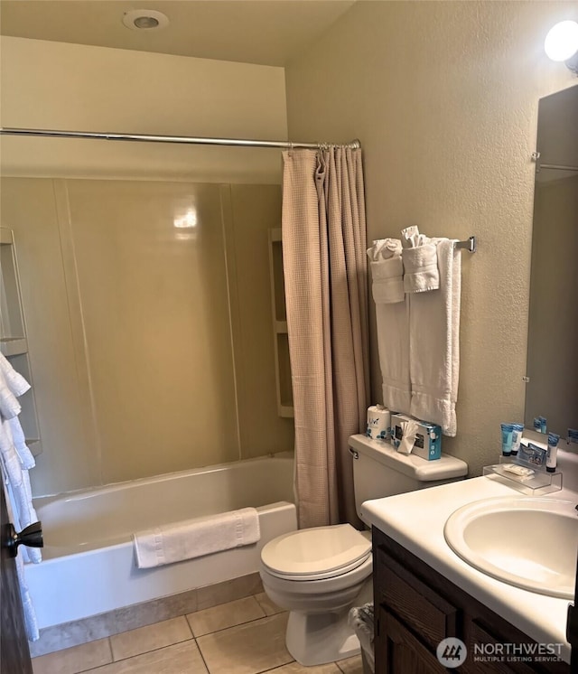 210 26th St NW Unit 106, Long Beach, WA 98361 - full bath with shower / tub combo, vanity, tile patterned floors, and a textured wall
