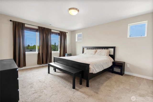 1447 E 48th St, Tacoma, WA 98404 - bedroom featuring light carpet and baseboards