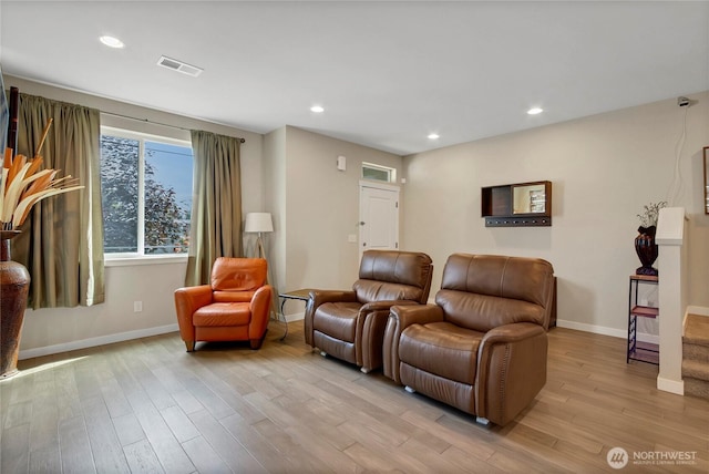 1447 E 48th St, Tacoma, WA 98404 - living room featuring light wood-style flooring and recessed lighting