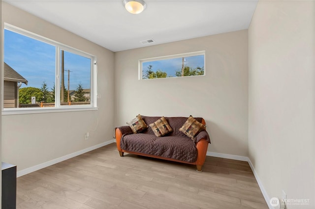 1447 E 48th St, Tacoma, WA 98404 - living area with light wood finished floors and plenty of natural light