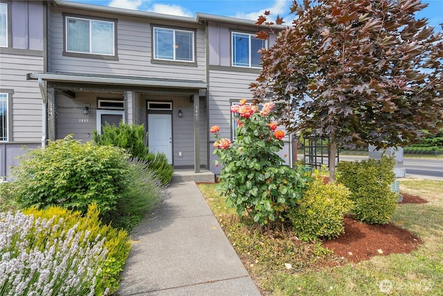 1447 E 48th St, Tacoma, WA 98404 - entrance to property featuring board and batten siding