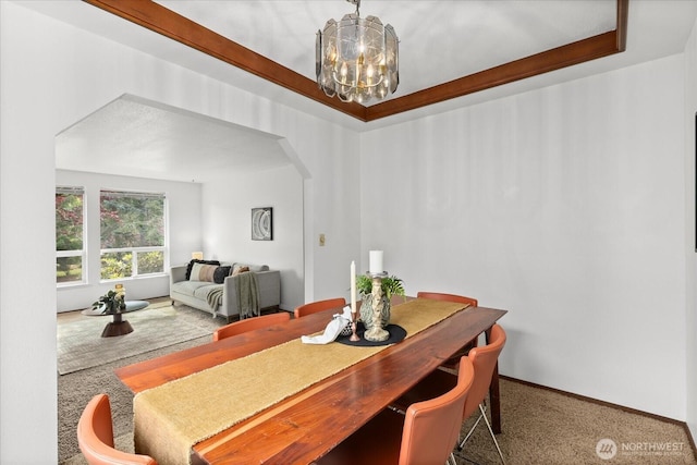 1513 Lowell Ave, Bellingham, WA 98229 - dining area featuring a chandelier, arched walkways, and carpet