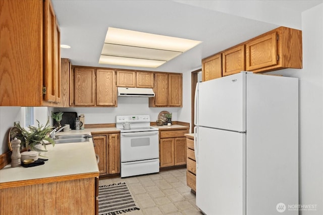 1513 Lowell Ave, Bellingham, WA 98229 - kitchen with white appliances, ventilation hood, light countertops, light floors, and brown cabinetry