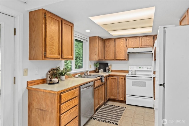 1513 Lowell Ave, Bellingham, WA 98229 - kitchen featuring white appliances, extractor fan, brown cabinets, and light countertops