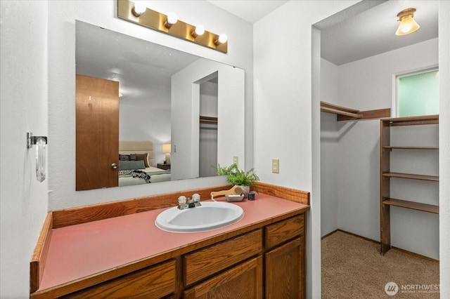 1513 Lowell Ave, Bellingham, WA 98229 - ensuite bathroom featuring vanity and a spacious closet
