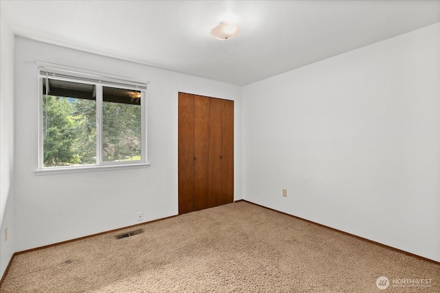 1513 Lowell Ave, Bellingham, WA 98229 - unfurnished bedroom featuring carpet flooring and a closet