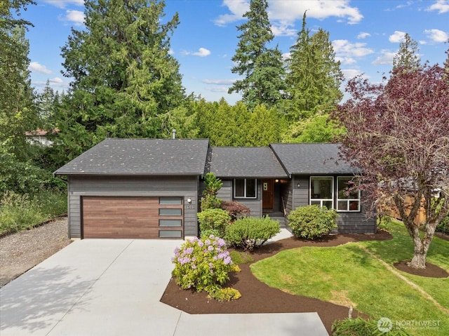 1513 Lowell Ave, Bellingham, WA 98229 - view of front of home with a garage, concrete driveway, a shingled roof, and a front lawn