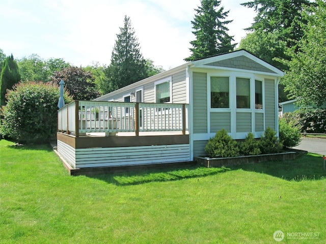 921 Autumn Ln Unit 254, Bellingham, WA 98229 - back of property featuring a wooden deck and a yard