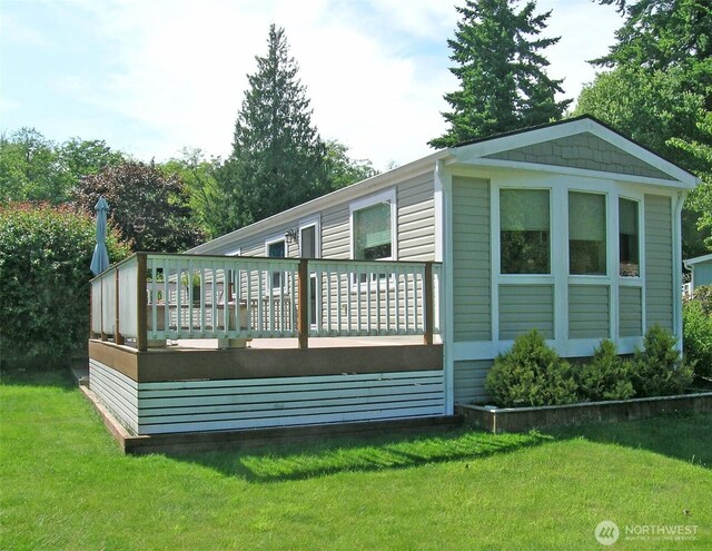 921 Autumn Ln Unit 254, Bellingham, WA 98229 - back of house with a deck and a lawn