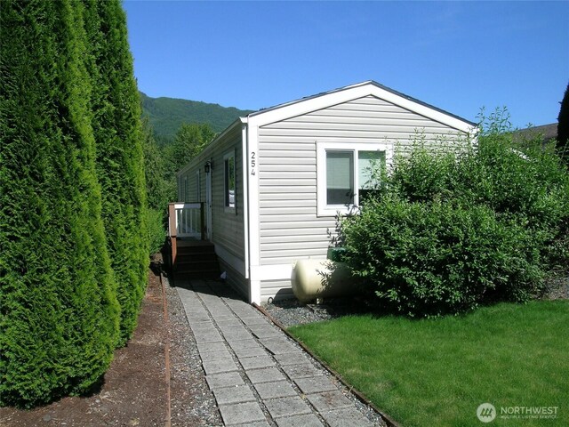 921 Autumn Ln Unit 254, Bellingham, WA 98229 - view of side of property with a yard