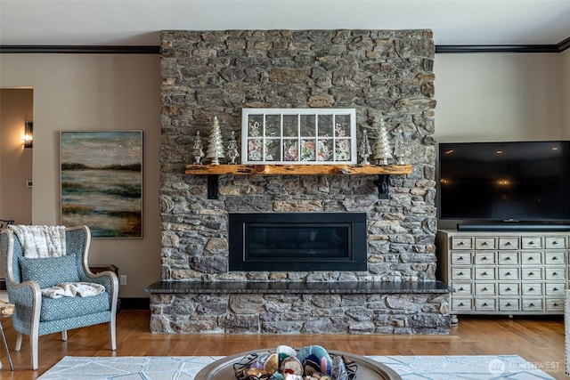 453 Spruce Ct NW, East Wenatchee, WA 98802 - living area with ornamental molding, wood finished floors, and a fireplace