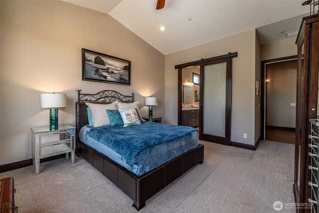453 Spruce Ct NW, East Wenatchee, WA 98802 - bedroom featuring a barn door, carpet flooring, vaulted ceiling, ensuite bath, and recessed lighting