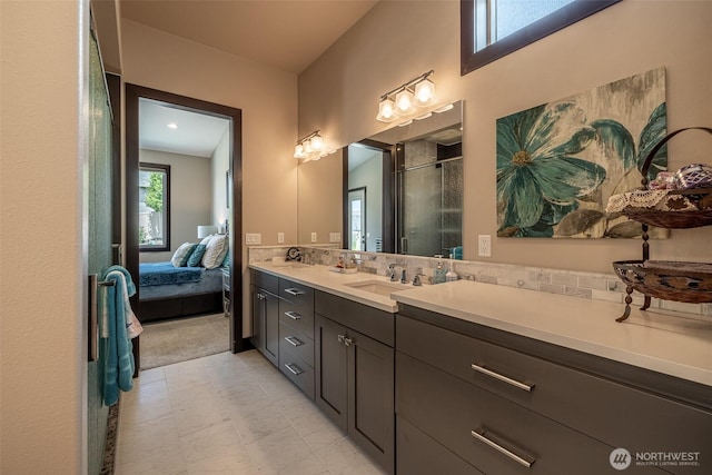 453 Spruce Ct NW, East Wenatchee, WA 98802 - bathroom featuring double vanity, ensuite bath, and a shower stall
