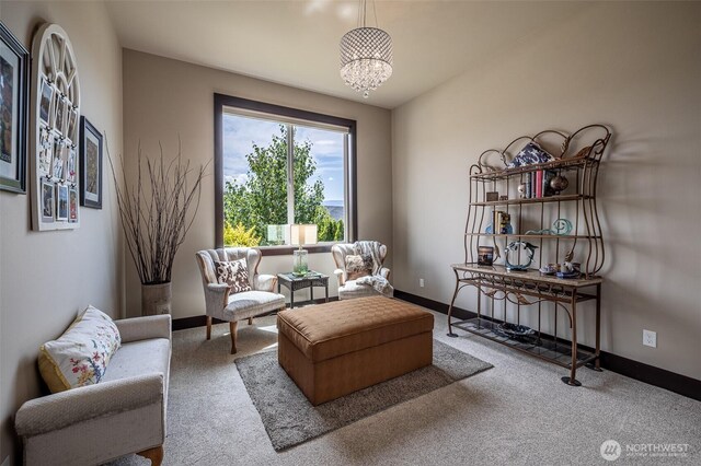 453 Spruce Ct NW, East Wenatchee, WA 98802 - sitting room with carpet flooring and a chandelier
