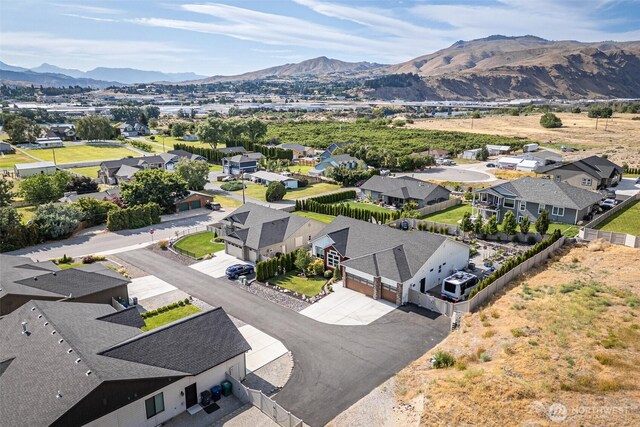 453 Spruce Ct NW, East Wenatchee, WA 98802 - aerial view of residential area featuring a mountain backdrop