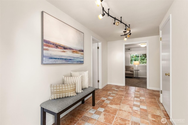 19508 23rd Ave NE, Shoreline, WA 98155 - corridor featuring stone tile flooring and baseboards