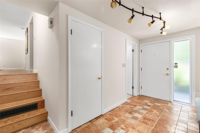 19508 23rd Ave NE, Shoreline, WA 98155 - foyer entrance featuring stone tile floors and stairway