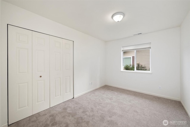 424 Wilson Ln, Sumas, WA 98295 - unfurnished bedroom with carpet flooring and a closet
