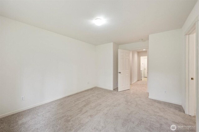 424 Wilson Ln, Sumas, WA 98295 - empty room with light carpet and baseboards